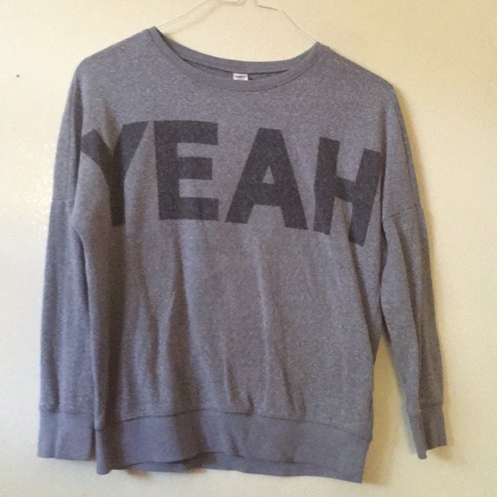 Grey sweatshirt with the words YEAH on it